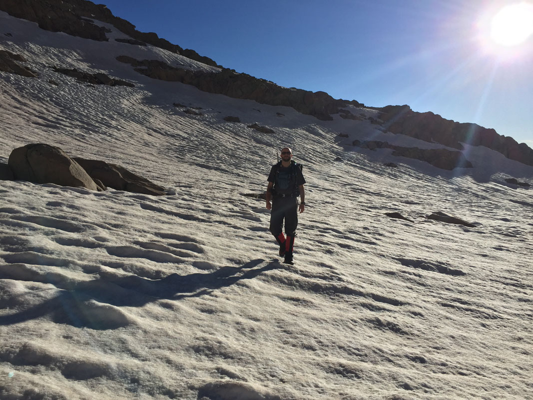 Crossing snowfield below Gladstone Peak