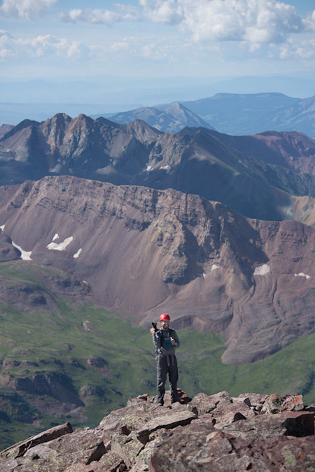 Matt cresting the summit of Maroon Peak